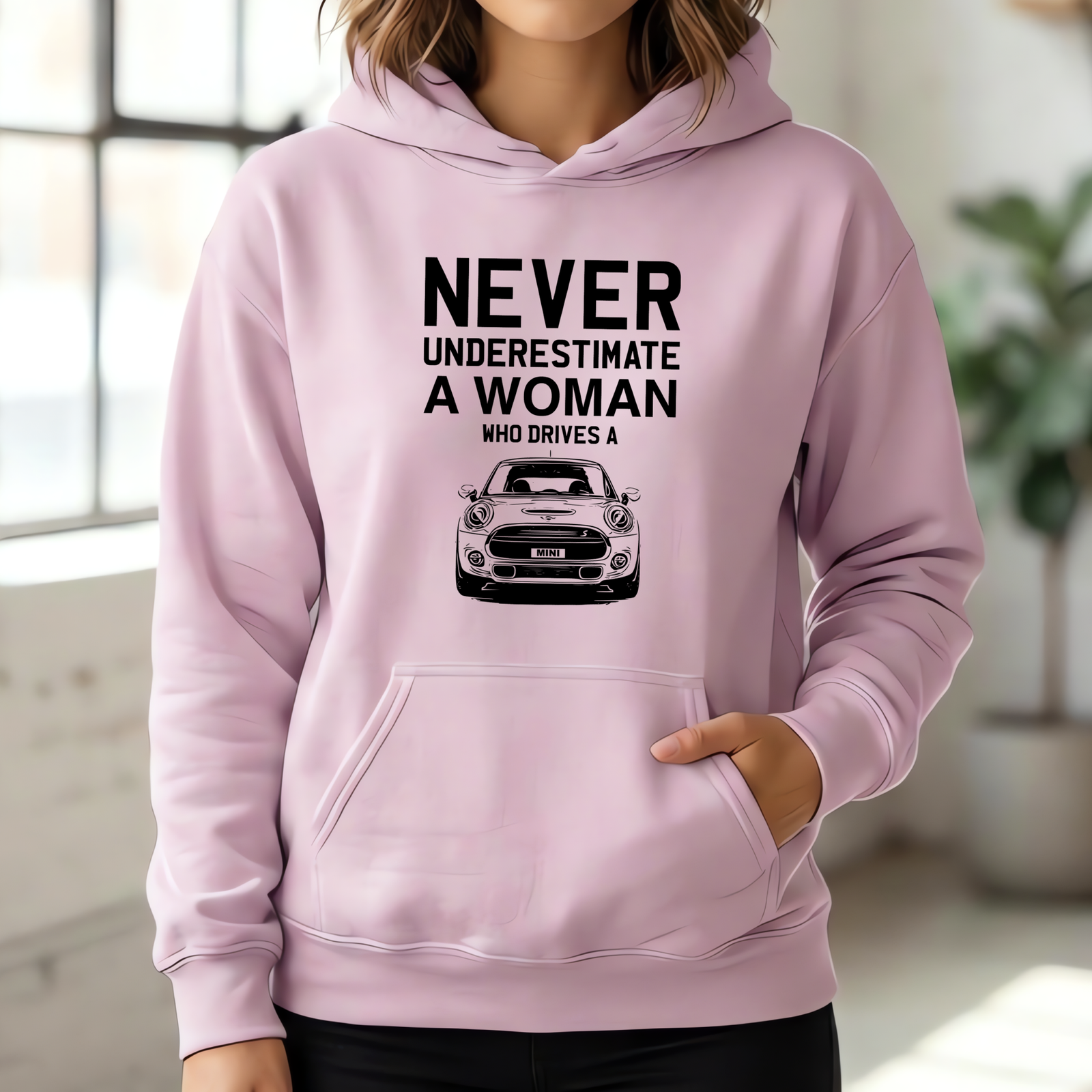 Never Underestimate a Woman Who Drives a Mini — Hoodie